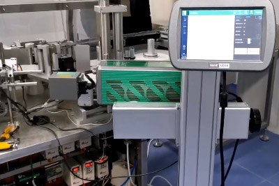 药厂贴标机应用二氧化碳激光机打码